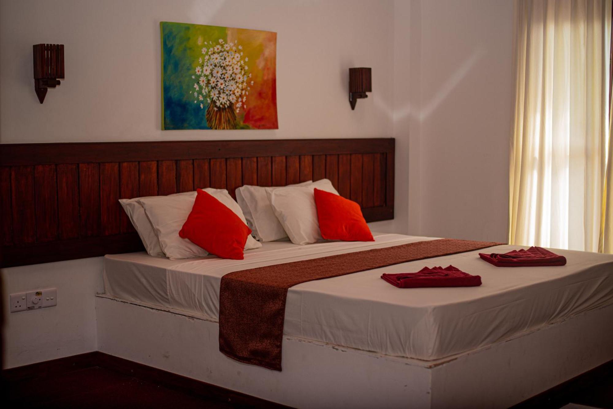 Sundowners Guesthouse Hikkaduwa Kamer foto